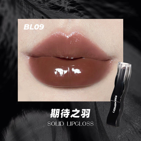 LEEMEMBER | Black Feather Lip Gloss